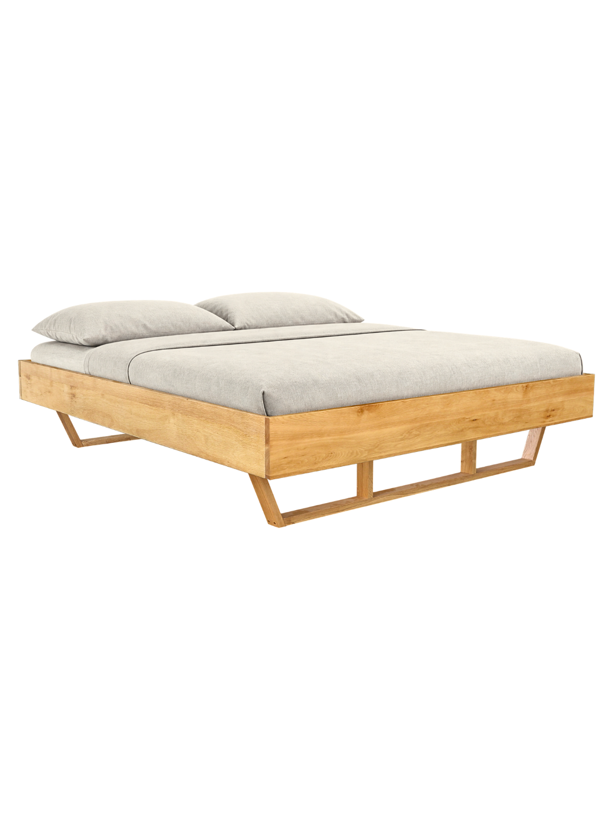 Massivholzbett Light aus Eiche ohne Kopfteil mit Holz-Kufenbeinen und grauer Bettwäsche als Doppelbett